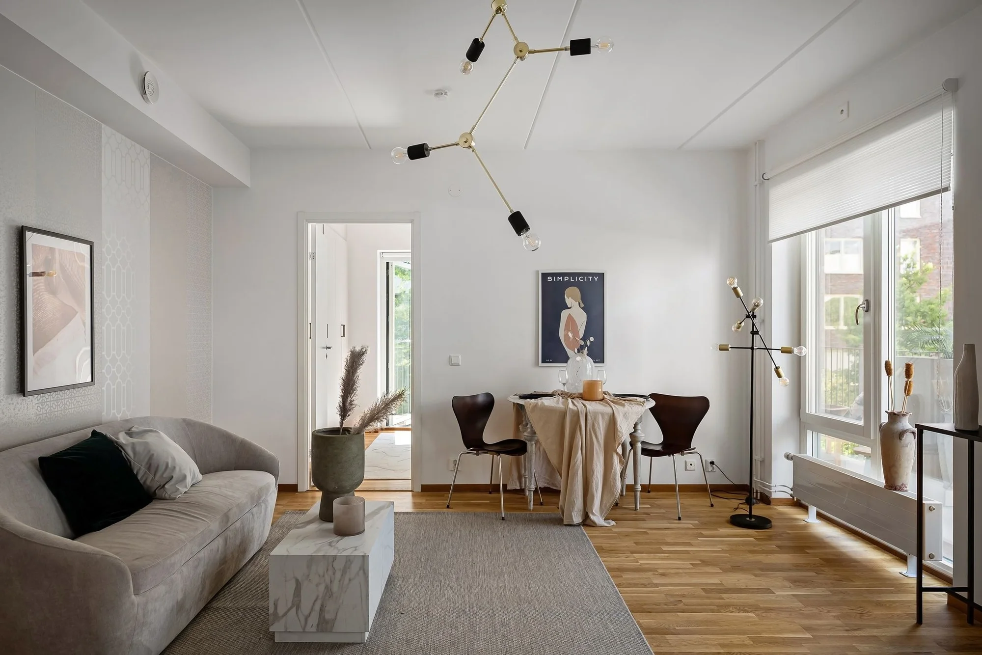 Bright, airy high-ceilinged living room